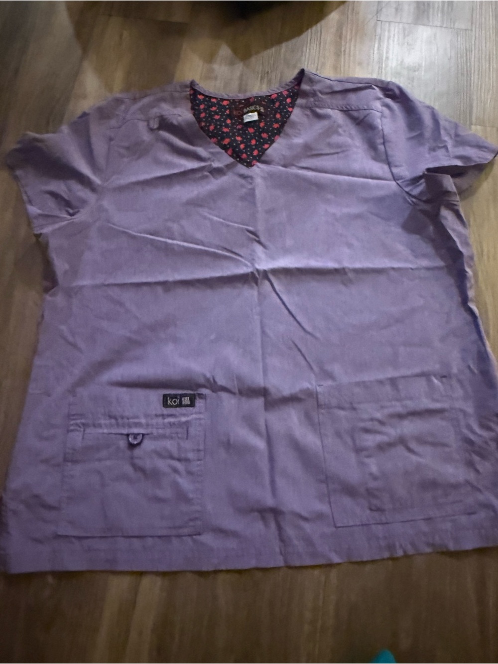 koi Lavender V-Neck Scrub Top with Navy Floral Trim